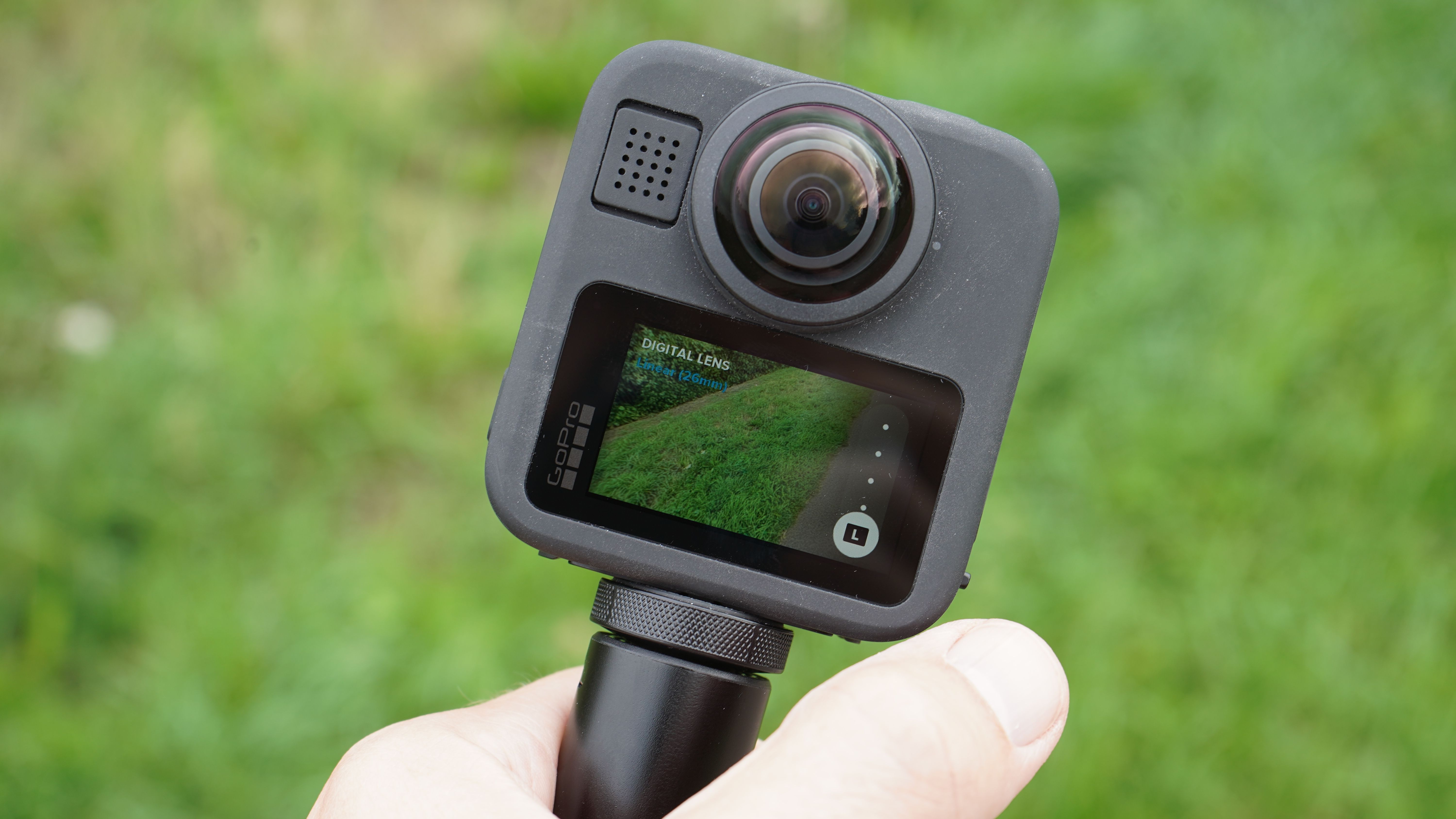 GoPro Max 2 in hand with screen visible