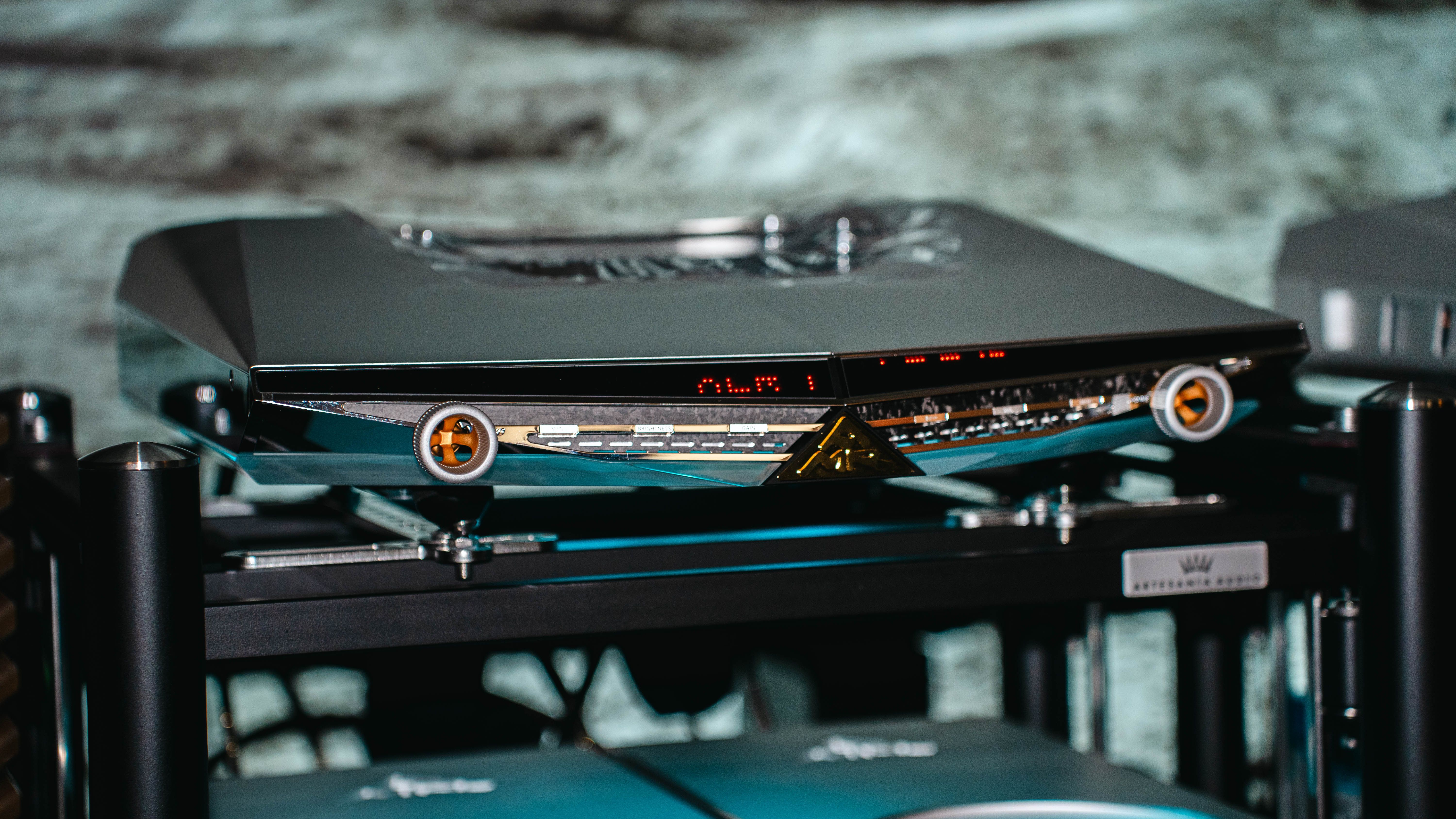 AMR's Luna Series separate on a hi-fi rack, with gray background