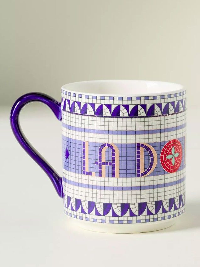 The Bistro Tile Stoneware Mug Italia Edition in Tomato from Anthropologie in blue and white