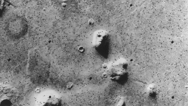 rocks on mars with one looking like a face when viewed from above.
