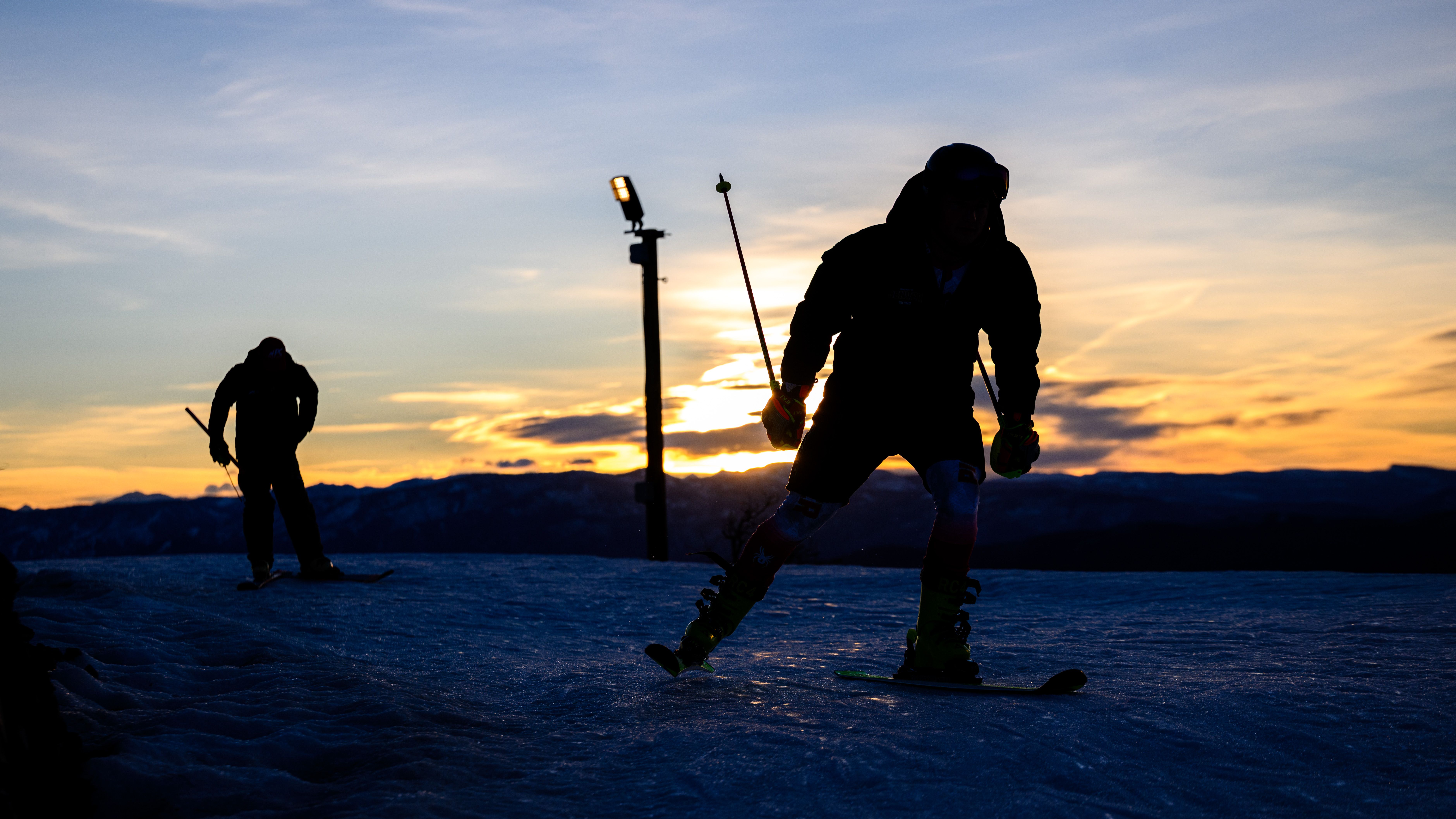 An athlete approaches the course predawn during the Slalom during the National Collegiate Men's and Women's Skiing Championships held at Utah Olympic Park and Soldier Hollow on March 13, 2026 in Park City, Utah.