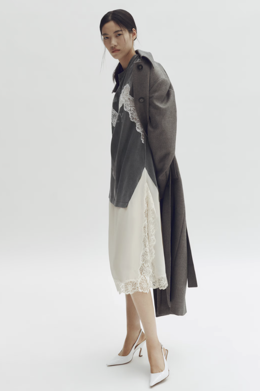 a model wearing an hm x stella mccartney dress