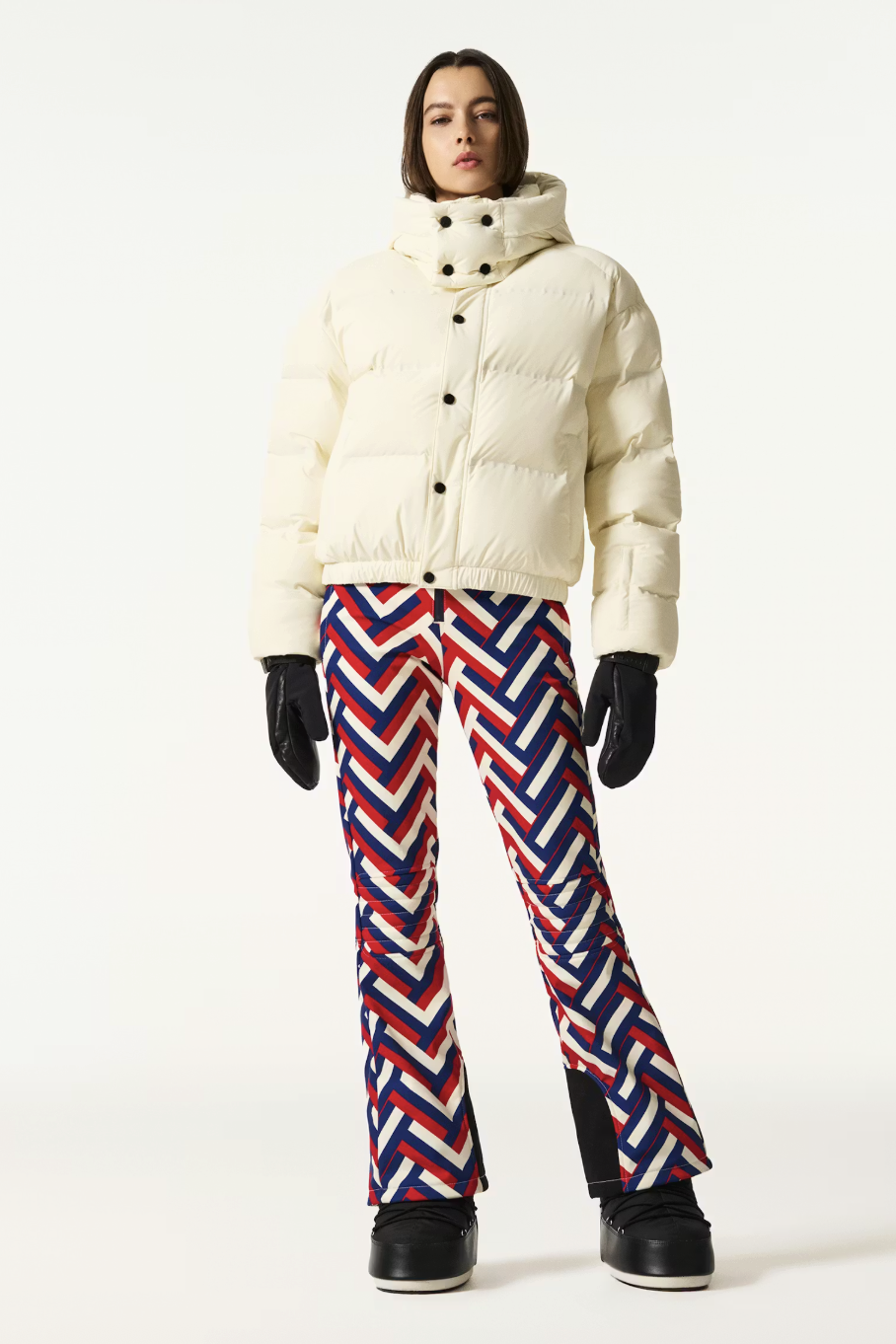 model in a white ski jacket