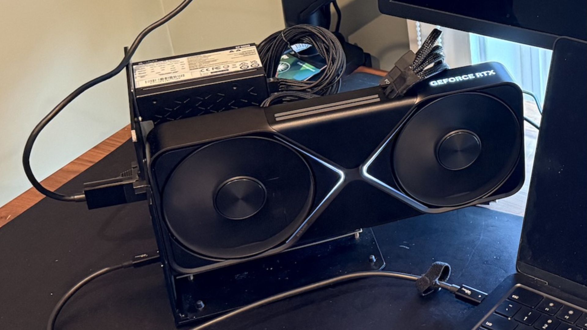 M5 Max MacBook Pro paired with RTX 5090 in an eGPU dock — runs
