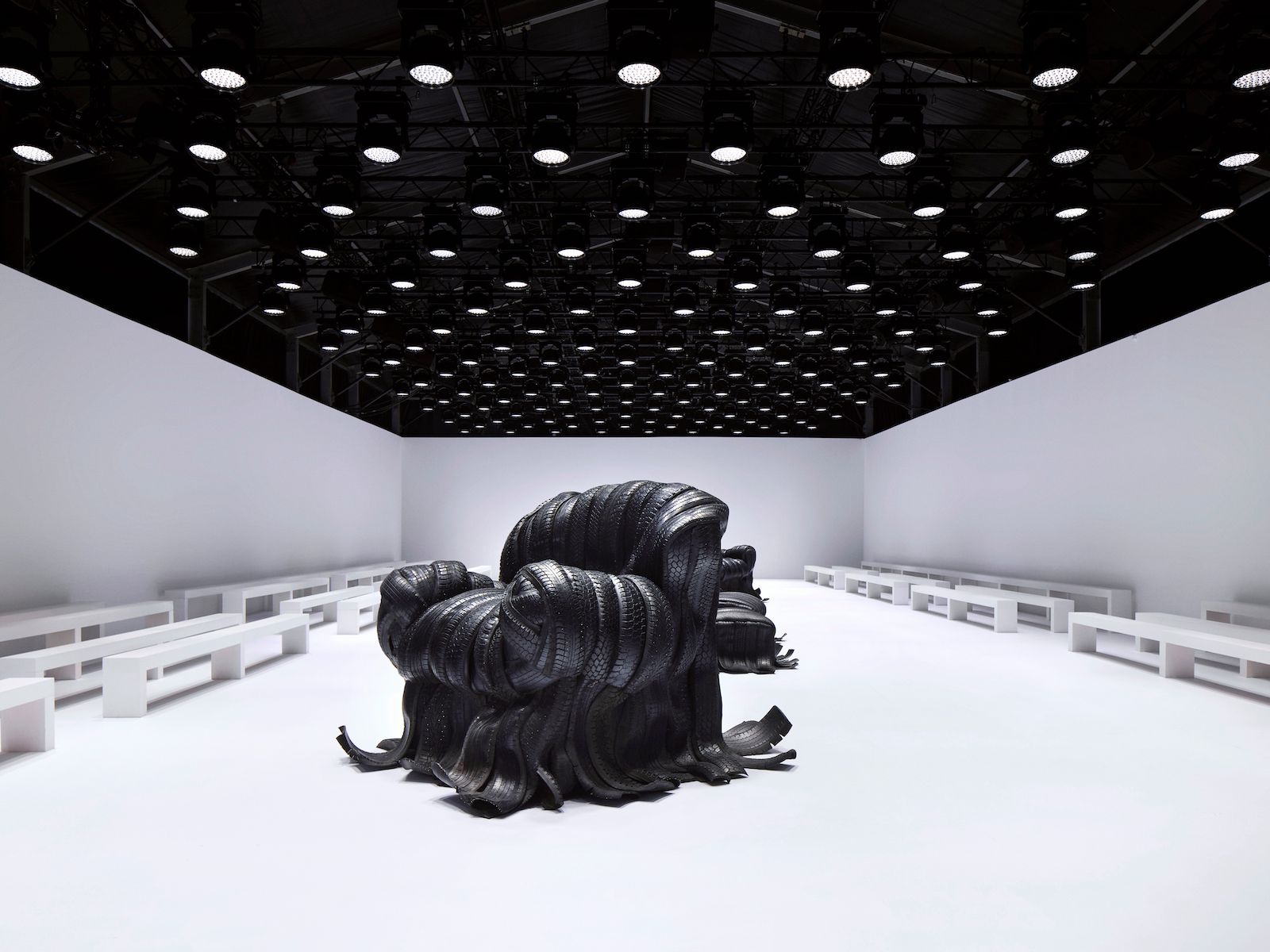 Acne Studios' A/W 2024 show set features rubber armchairs
