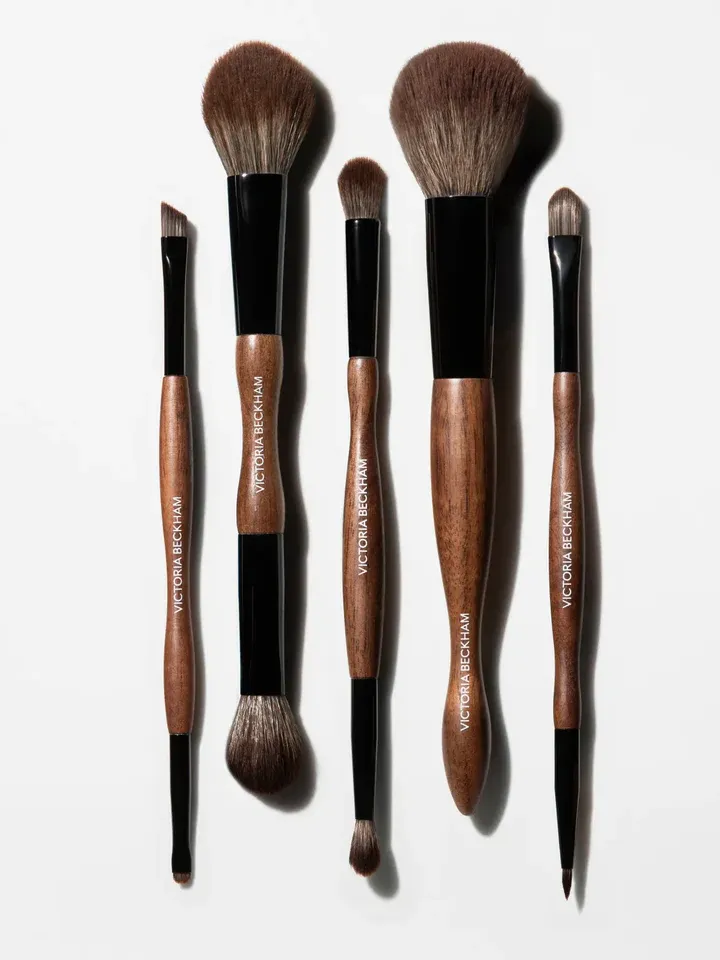 Victoria Beckham brushes