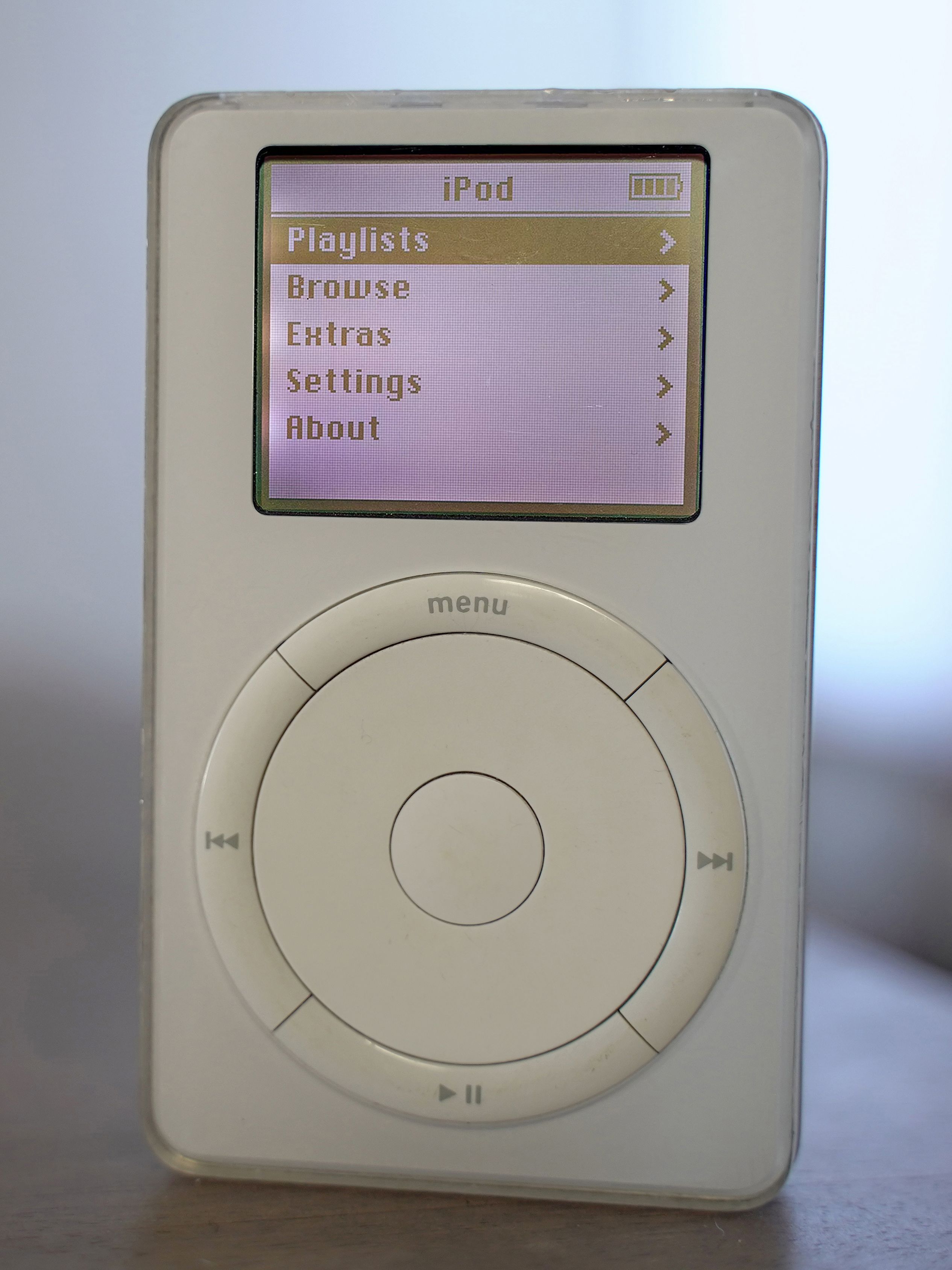 A first generation iPod sitting on a table