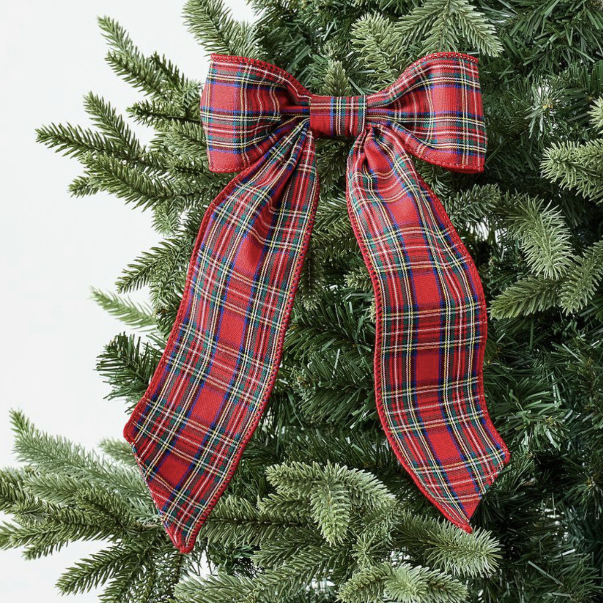 Plaid bow on Christmas tree