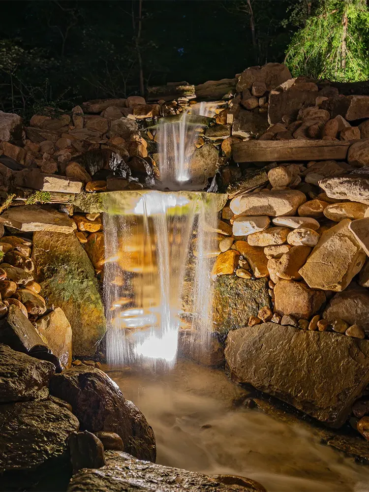 waterfall with lights