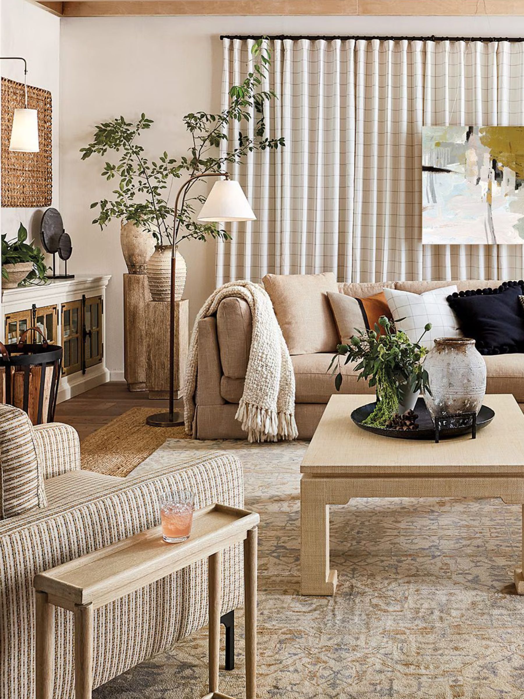 Neutral living room with beige couch and wooden coffee table