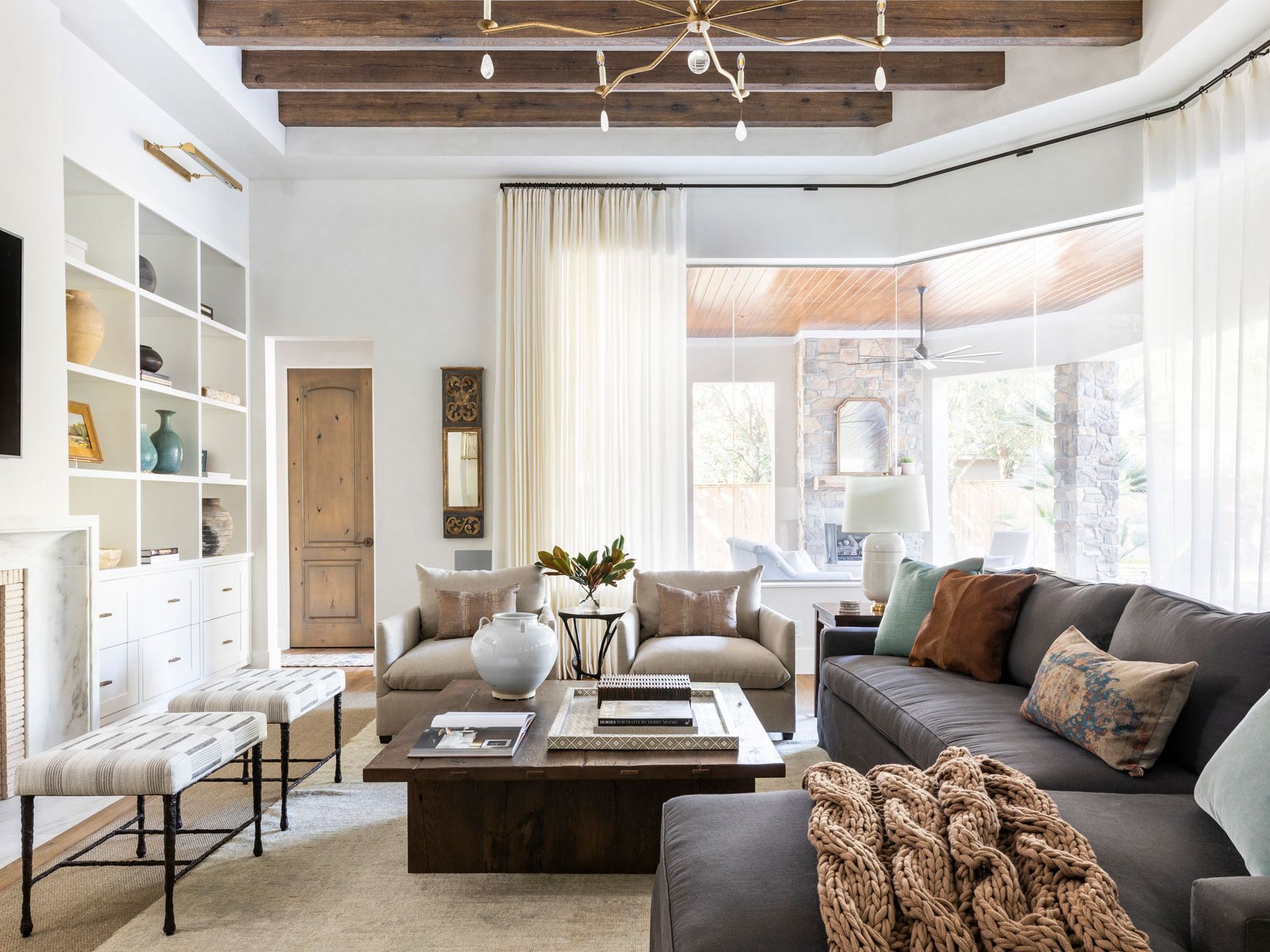Cozy textiles for living space with soft blankets and decorative cushions