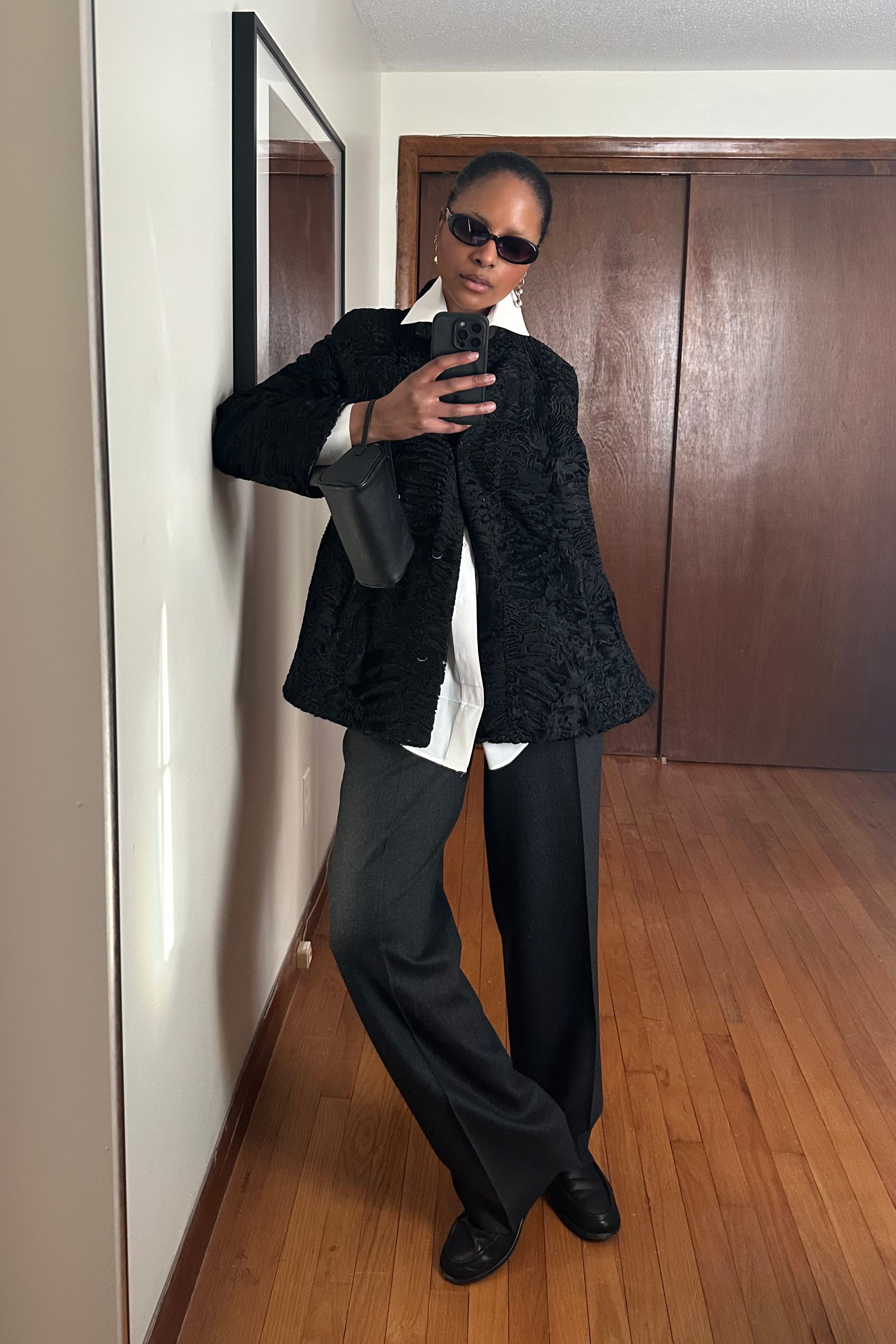 Maya Moore taking a selfie wearing a black and white outfit