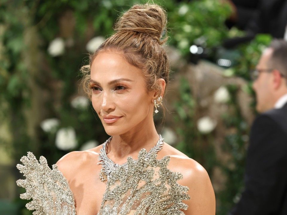 jlo in silver dress The iconic @jlo wearing our JLo Cross Diamond Gown at the @amas., , Originally unveiled as the opening look during the La Bohme Fall/Winter 2023 runway show, this gown was conceived as a tribute to