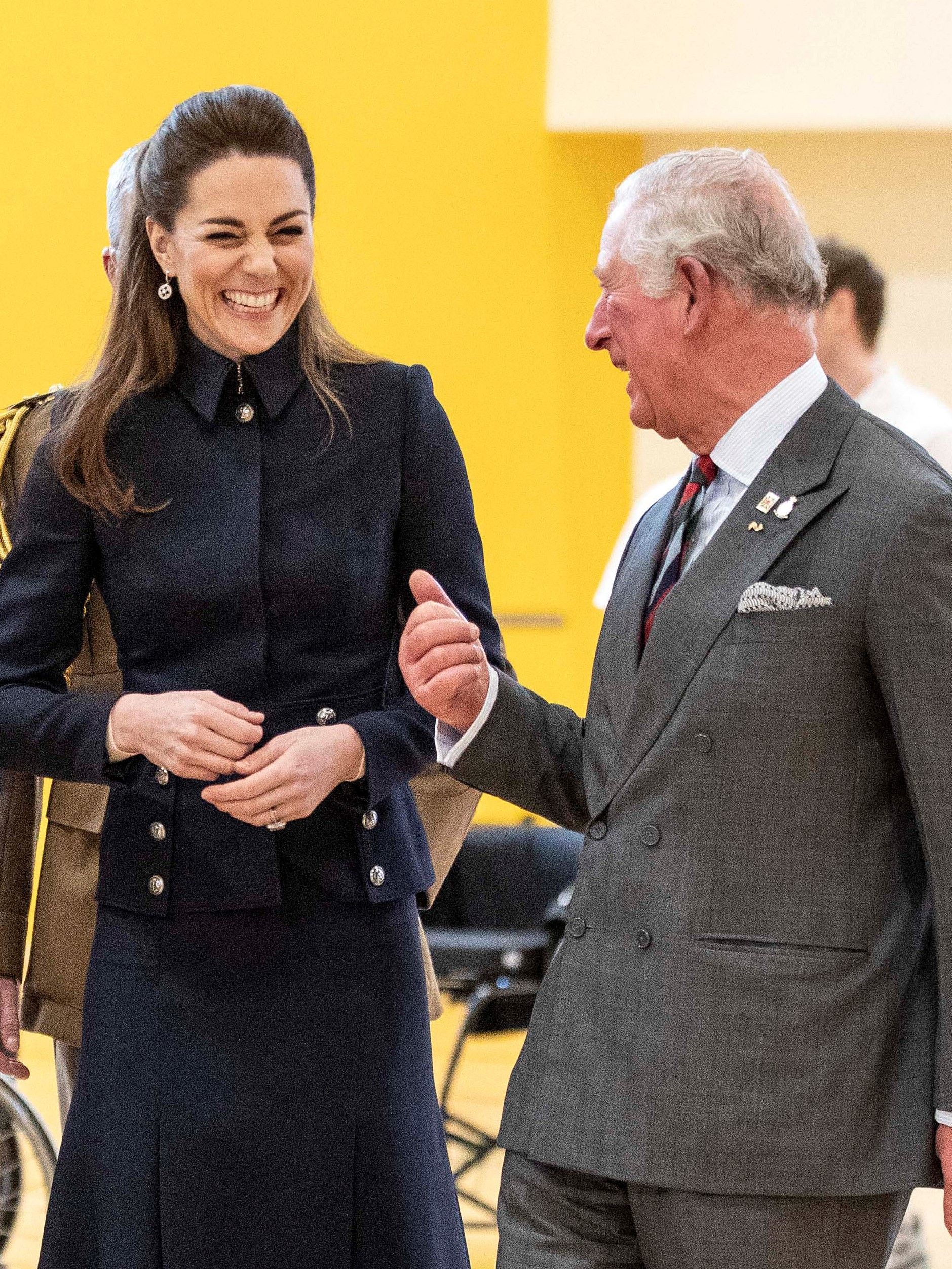 Prince William, Duke of Cambridge (3L) and his wife Catherine, Duchess of Cambridge (2R) talk with his father Prince Charles, Prince of Wales (R) (Photo by RICHARD POHLE/POOL/AFP via Getty Images)