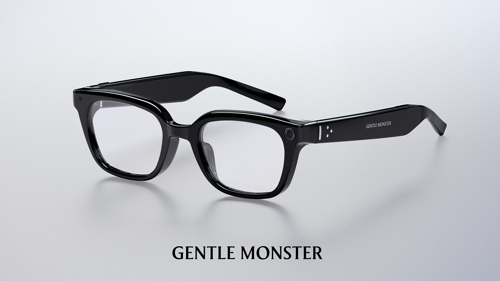 A pair of black Gentle Monster smart glasses featuring integrated cameras on the front corners and branding for Google and Samsung.