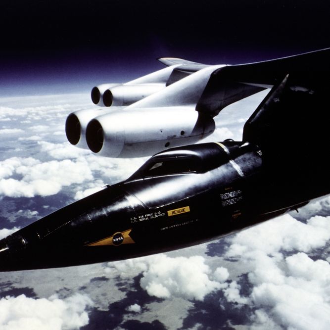 Space History Photo: X-15 Mounted to B-52 Mothership Pylon in