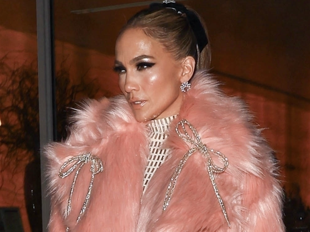 Jennifer Lopez Wears a Pink Fur Coat & $3,580 Gown for the Grammys