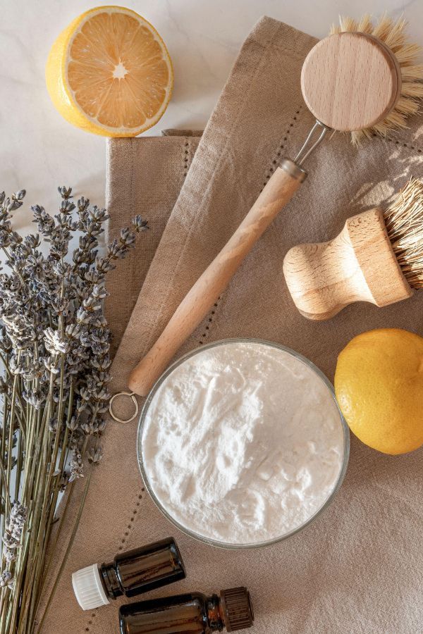 A set of natural cleaning products made from sustainable materials like bamboo