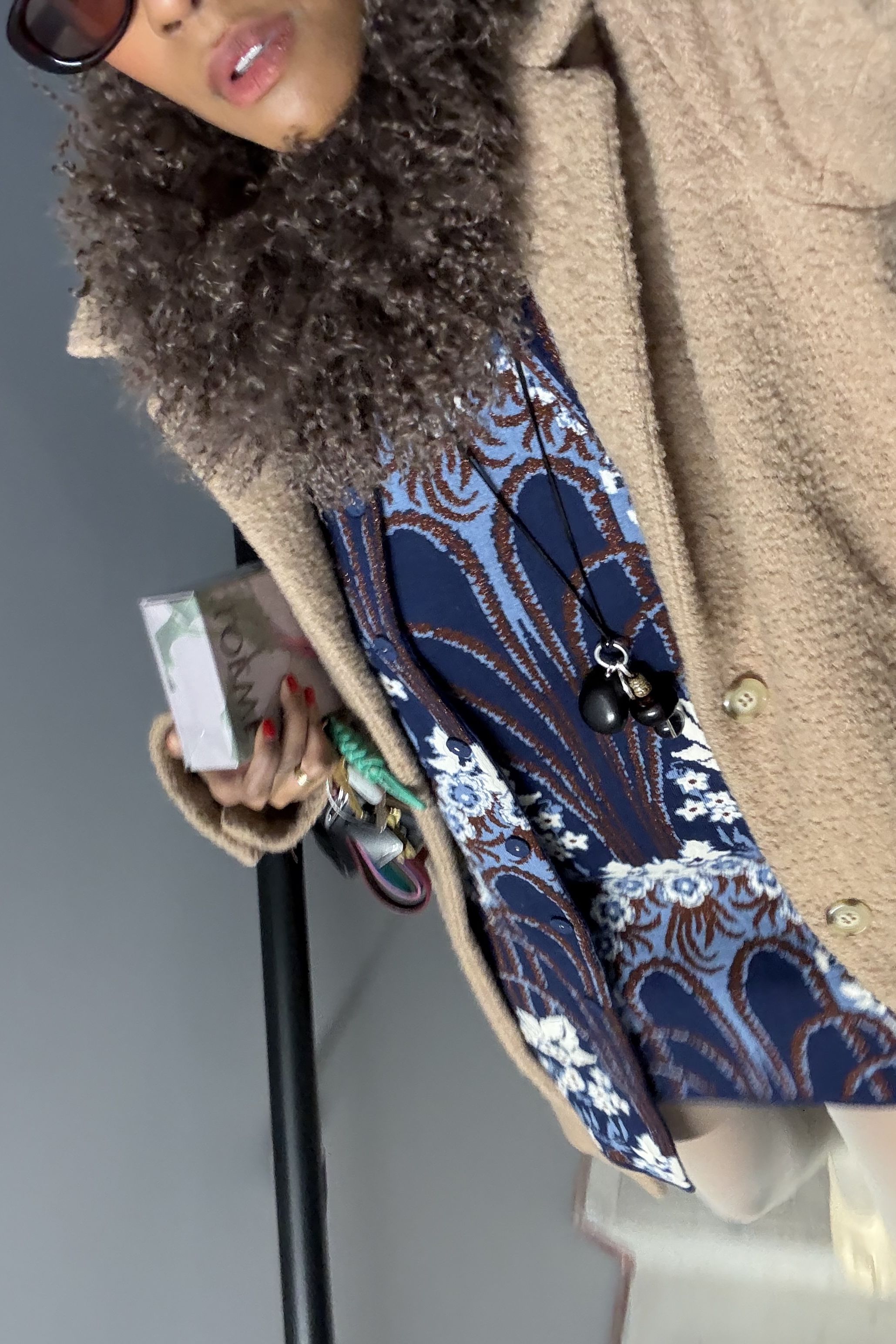 Ashley Moubayed wering a fuzzy lamb collar