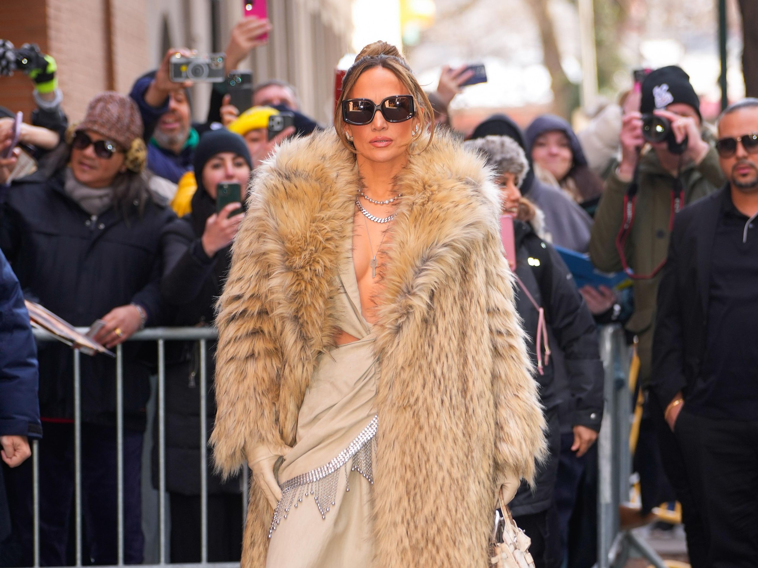 Jennifer Lopez Bundled Up in Three Loud Luxury Coats for a Single Morning