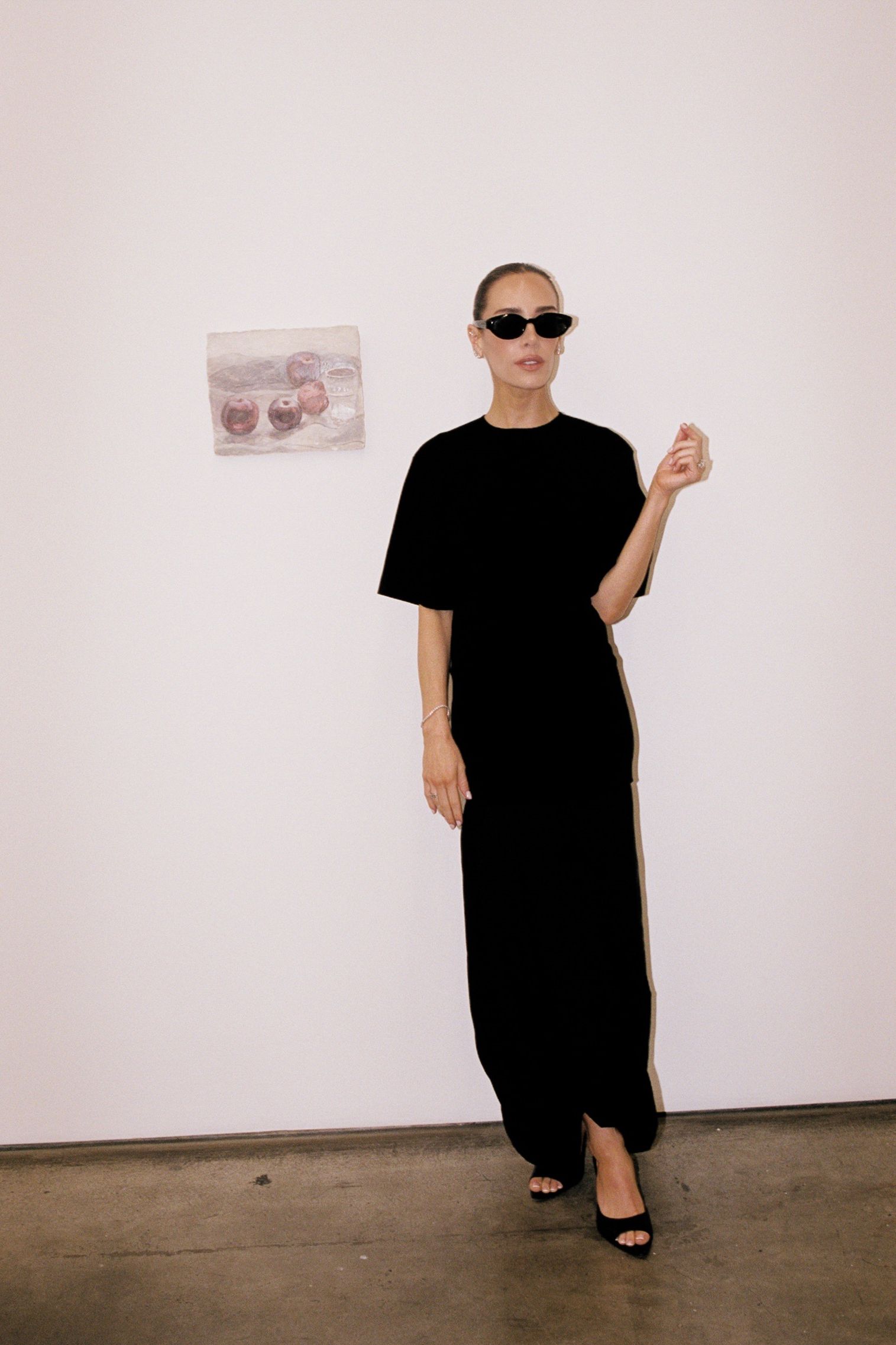 Kira Mackenzie Jackson's new wardrobe includes a lot of full length black dresses