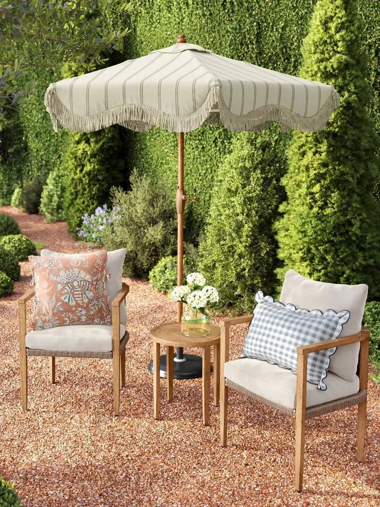 bistro set under umbrella