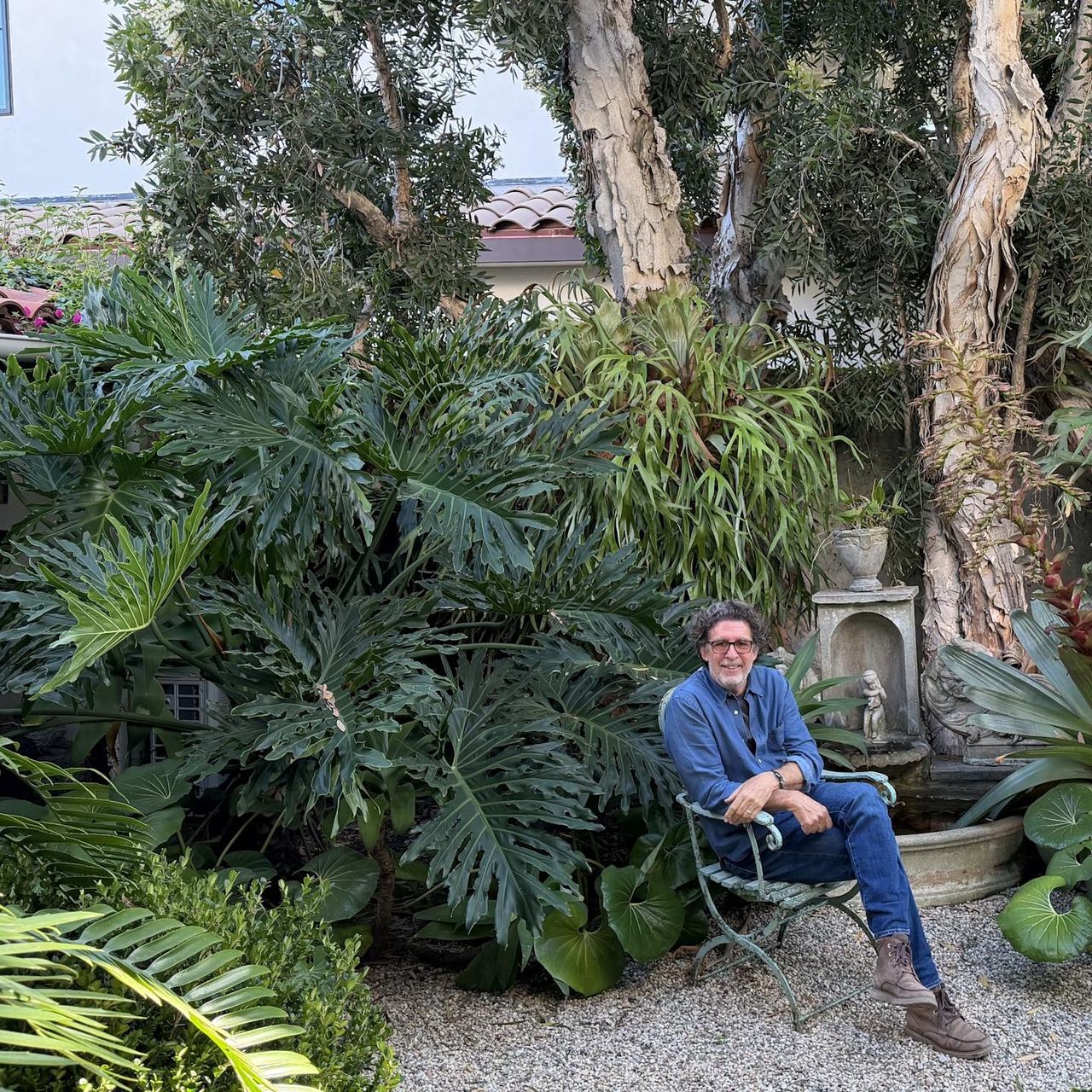 Stephen Block sitting in his garden