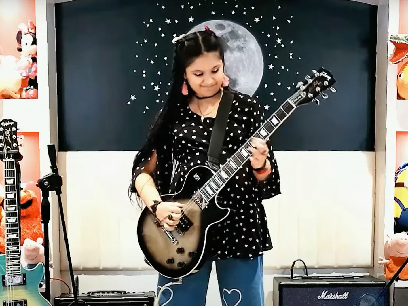 9-year-old Maya Neelakantan plays Tool medley on Adam Jones guitar