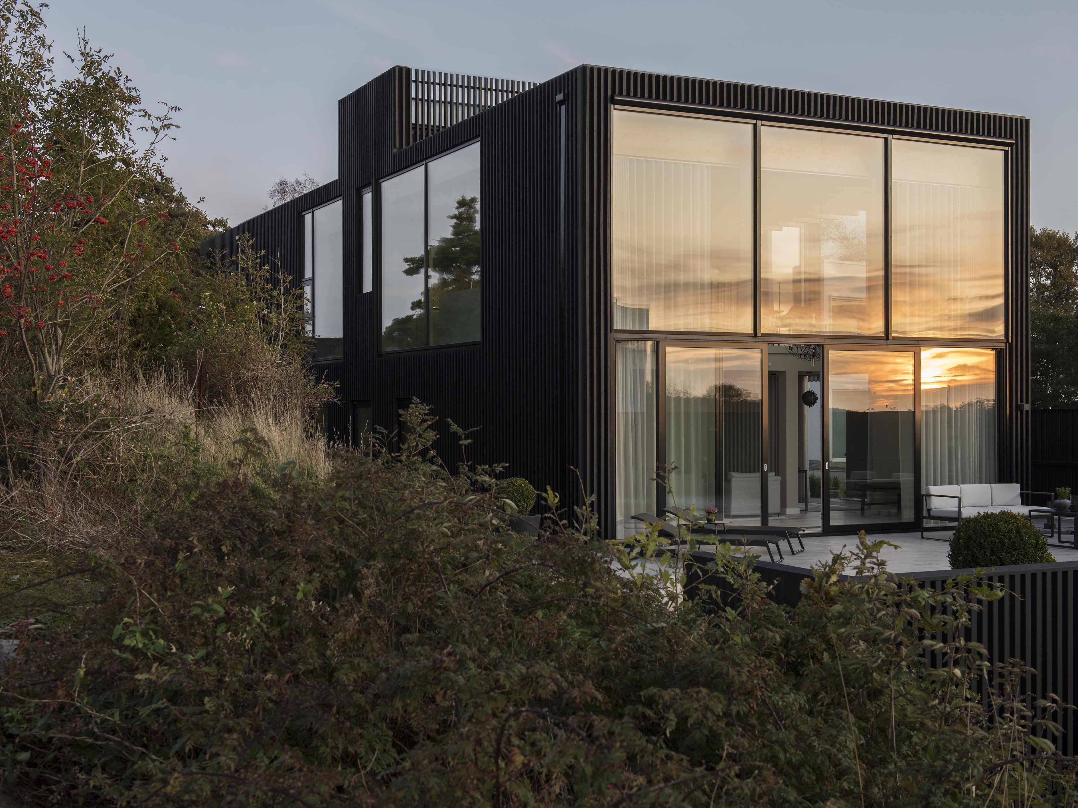 Bornstein Lyckefors creates suburban black house Villa Hovås