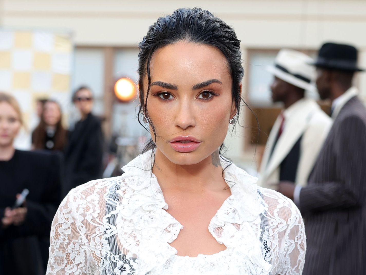 Demi Lovato's Skirt Trend Makes Black Tights Look Chic | Who What Wear Demi Lovato's Skirt Trend Makes Black Tights Look Chic | Who What Wear