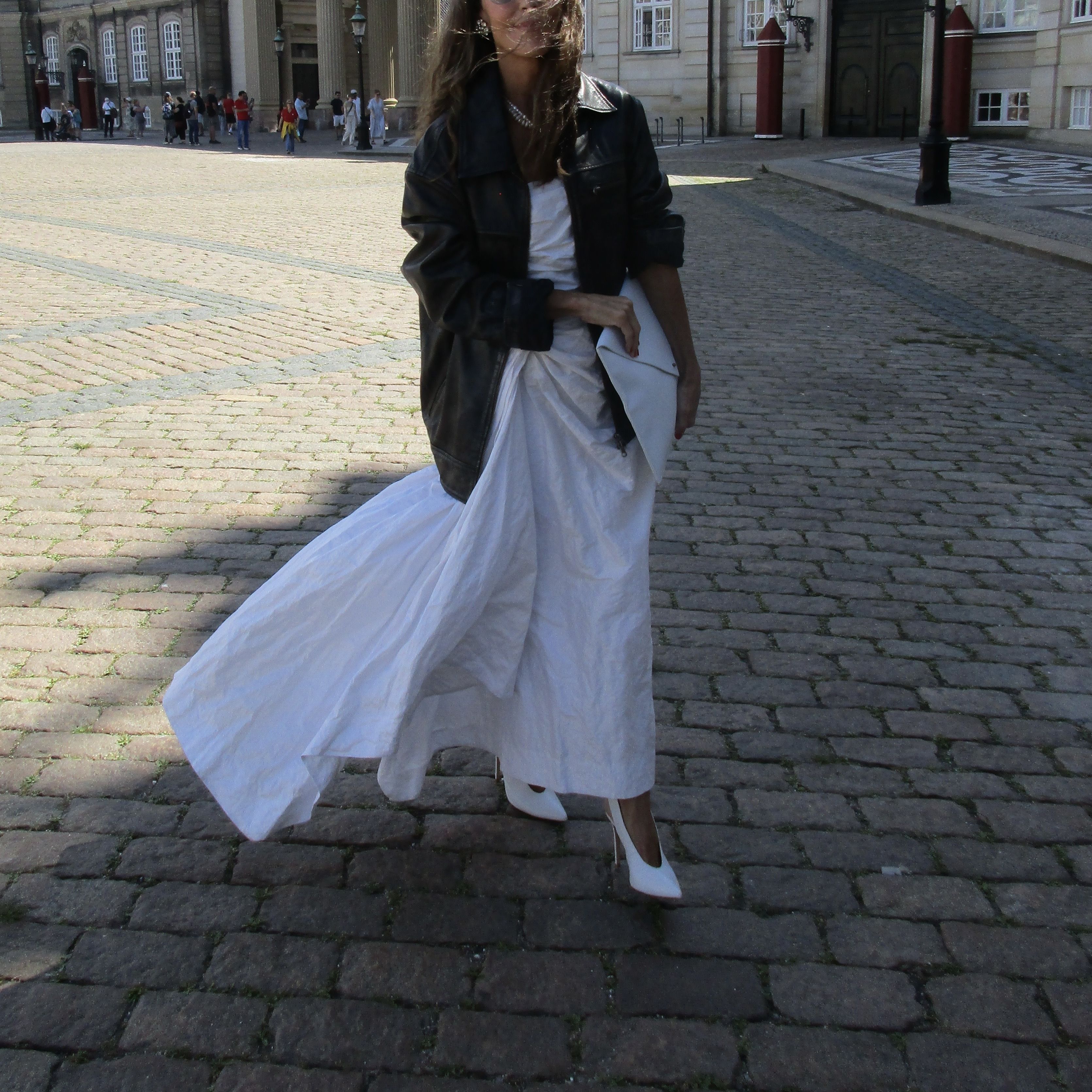Larissa Mills takes inspiration from Carrie Bradshaw in a long white cotton dress and oversized jacket