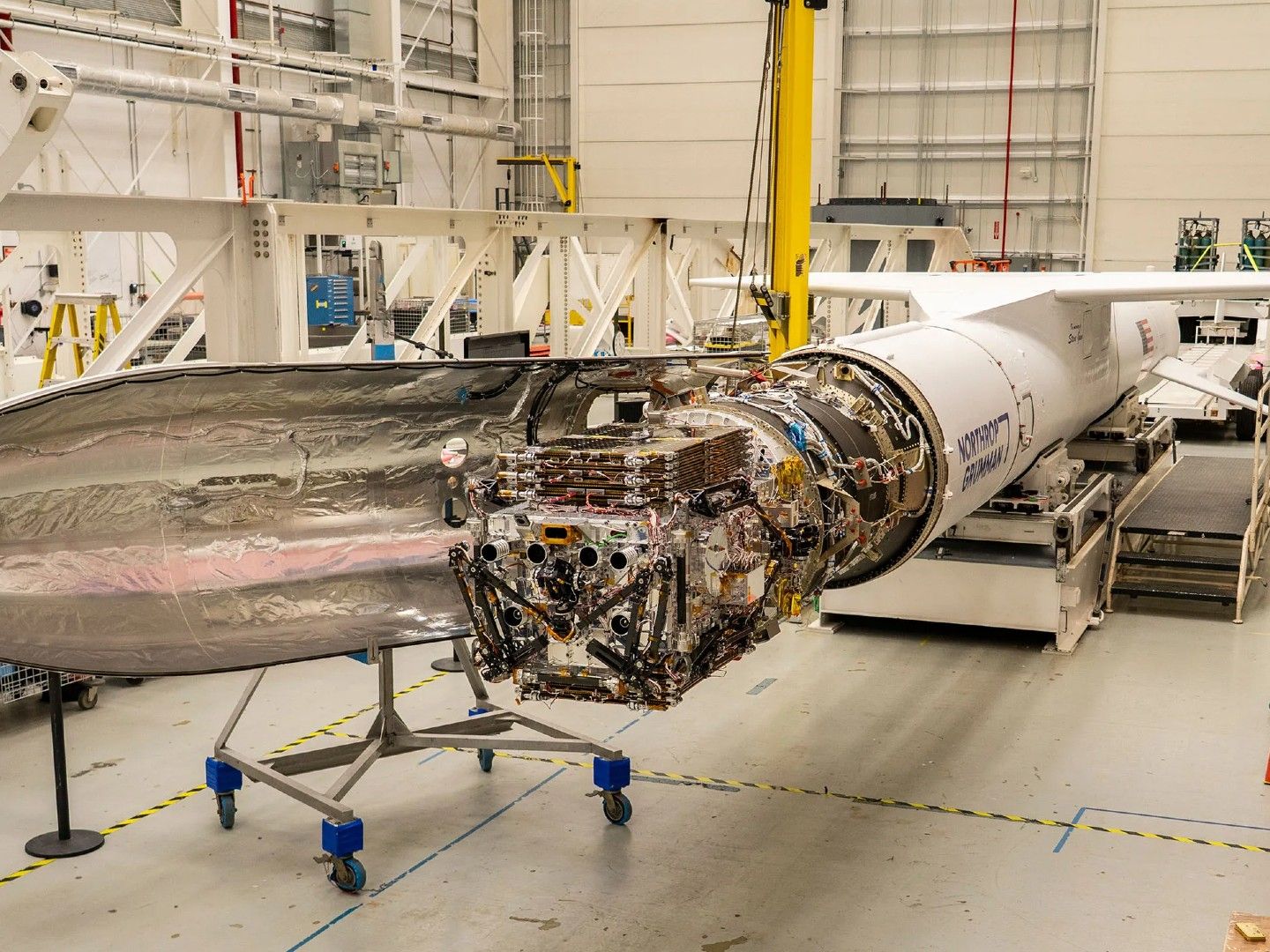 Satellite-boosting spacecraft readies for launch inside air