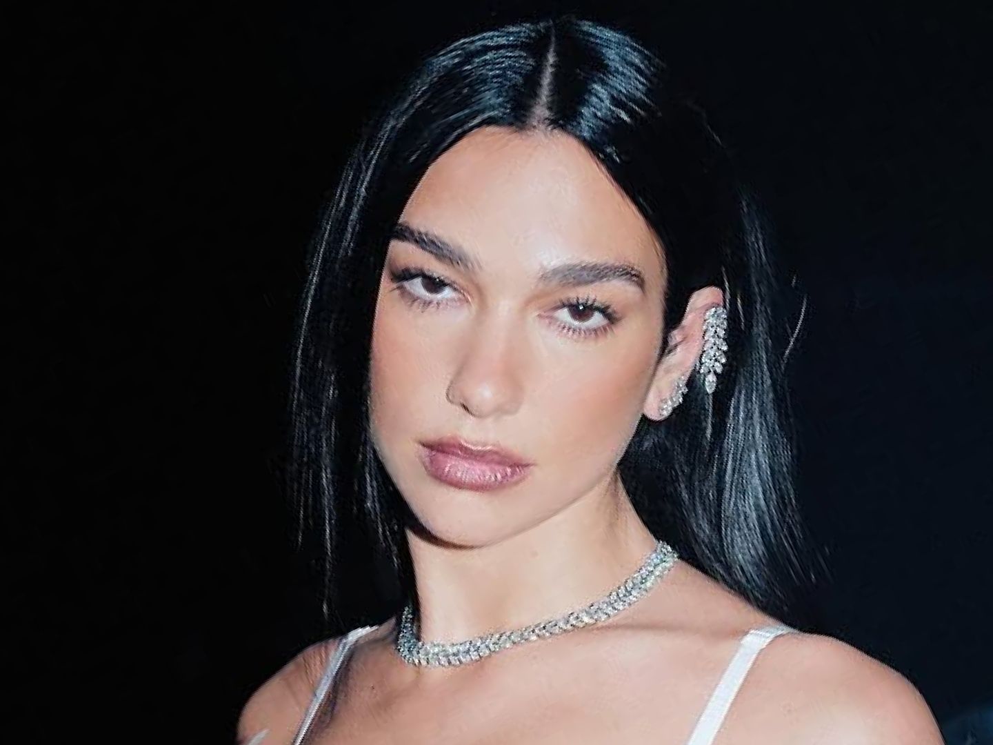 Dua Lipas Beach Outfit Pairs a Chanel Sweater and $995 Flats | Marie Claire