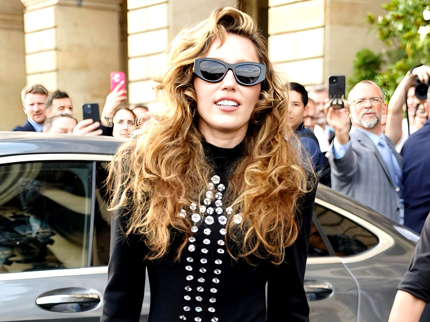 Miley Cyrus Styles a Vintage Eiffel Tower Dress in Paris