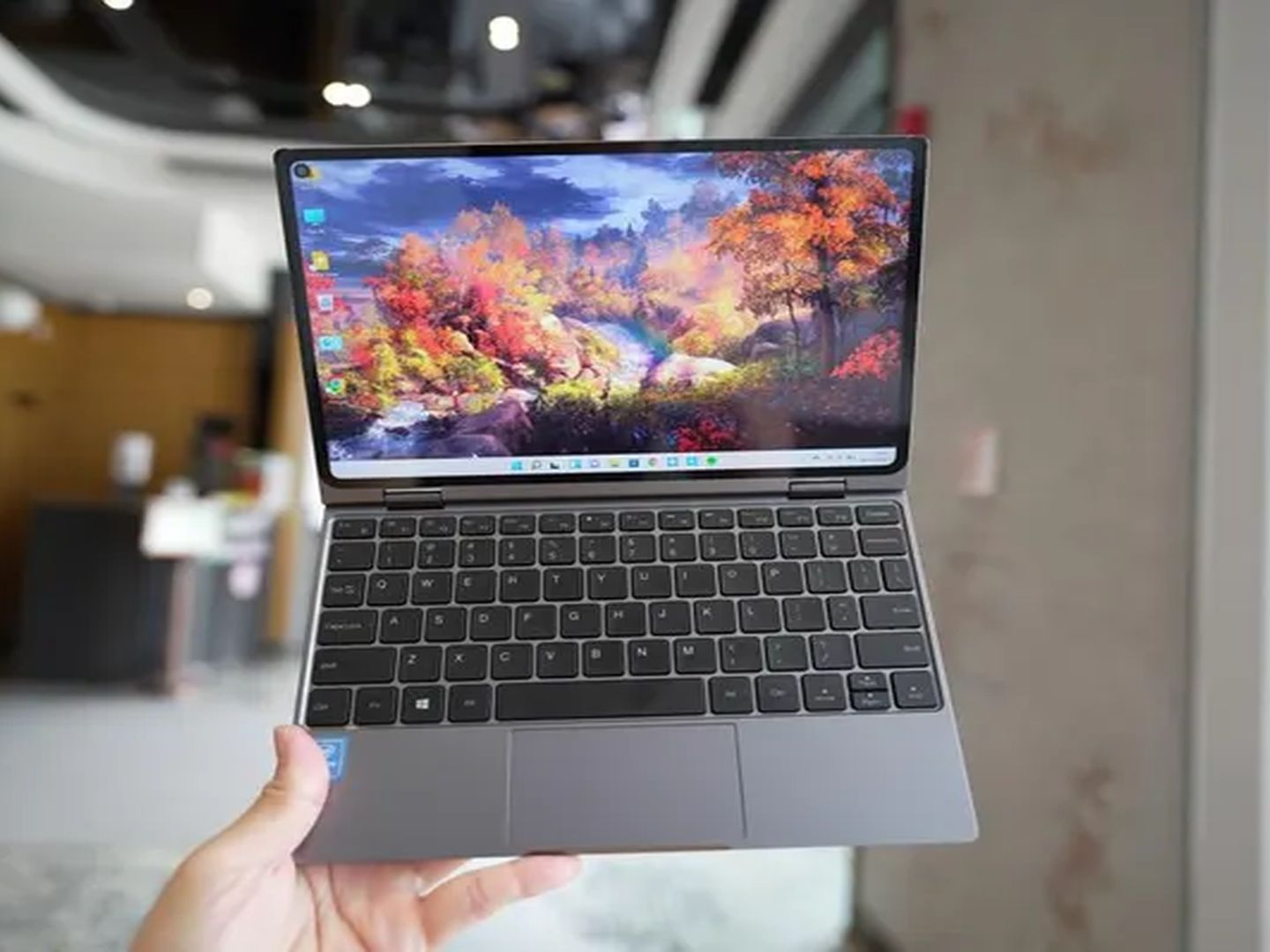 This cute convertible laptop looks like a mini PC with a