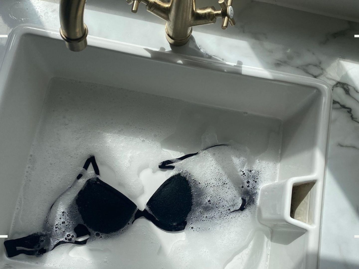 Can I wash a sports bra in hot water?