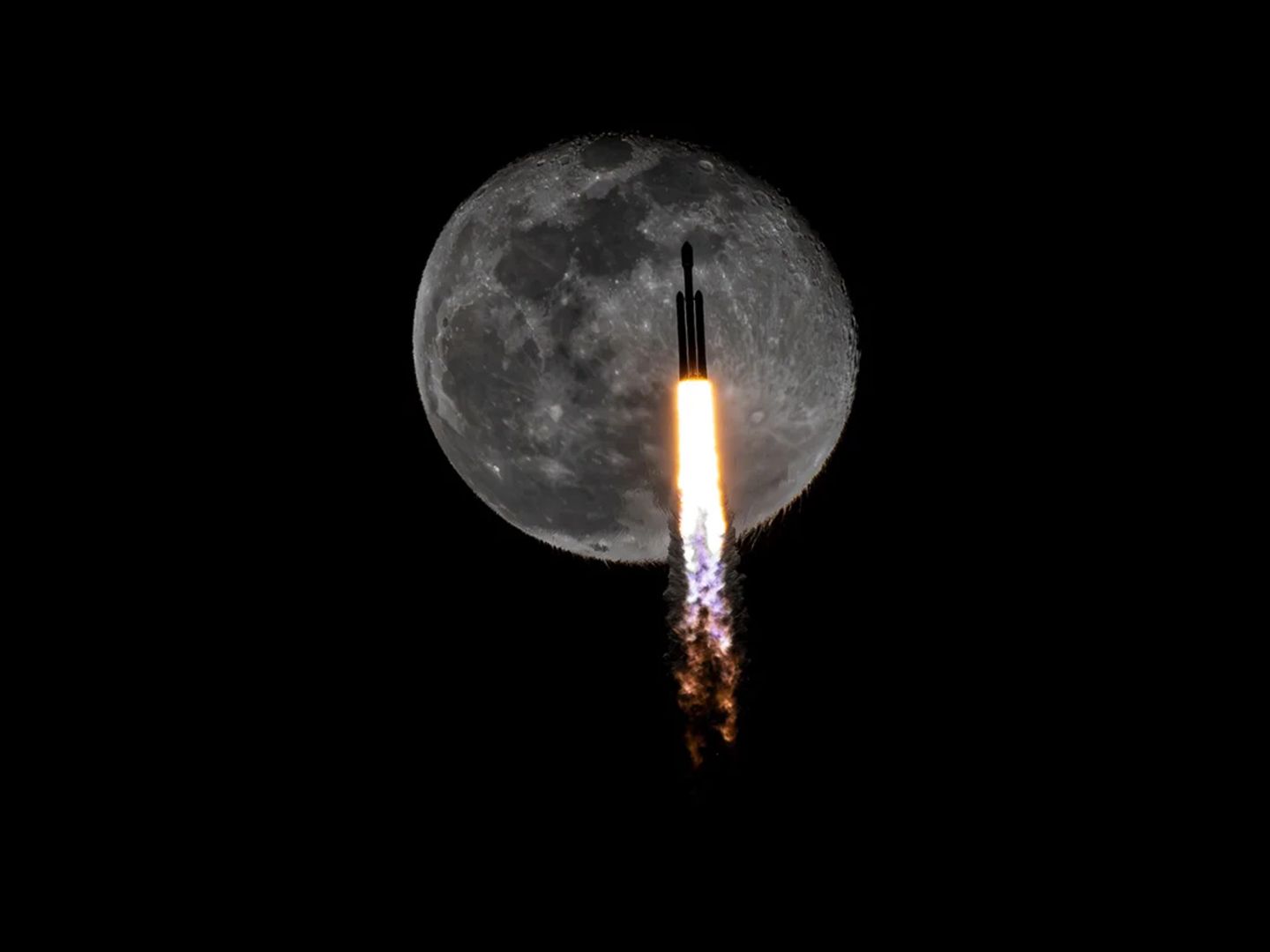See a SpaceX rocket photobomb the moon in incredible award-winning