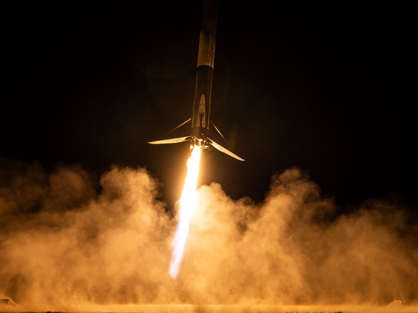 SpaceX's fiery Falcon 9 comes in for a landing photo of the day