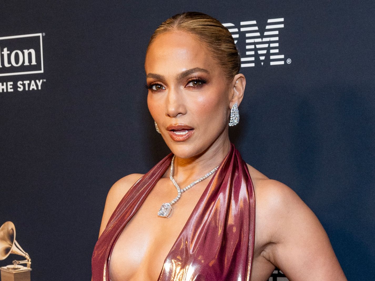 Jennifer Lopez Pairs a Plunging, Backless Dress With a $25 Million  Cushion-Cut Diamond Necklace