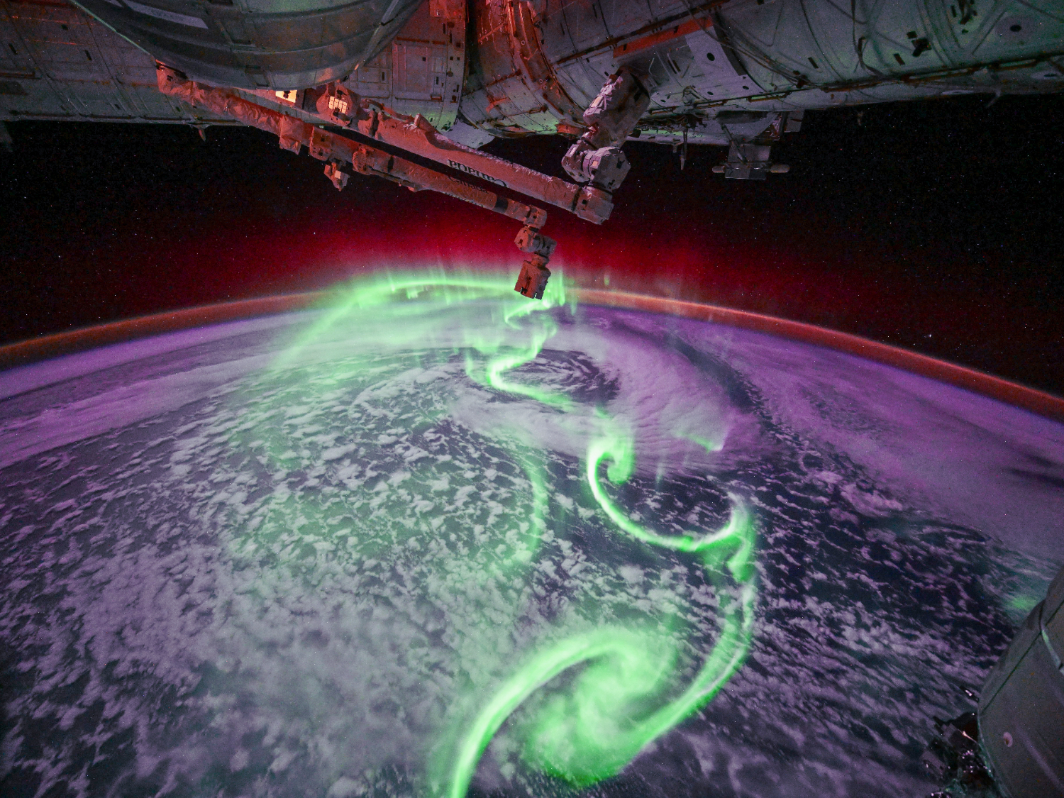 Neon green auroras from space will take your breath away photo of