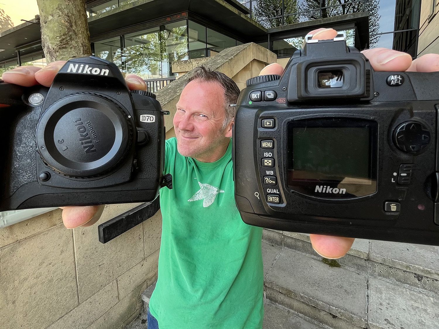 I found a pair of Nikon D70 DSLR cameras in the cupboard. They're