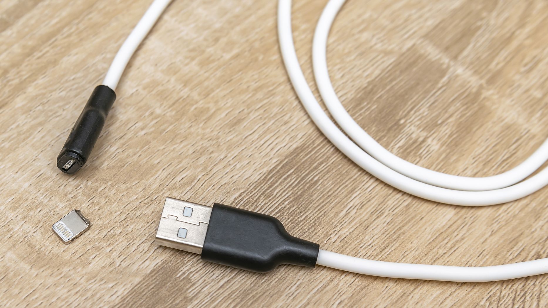 Damaged broken micro iPhone Lightning input USB port charger cable