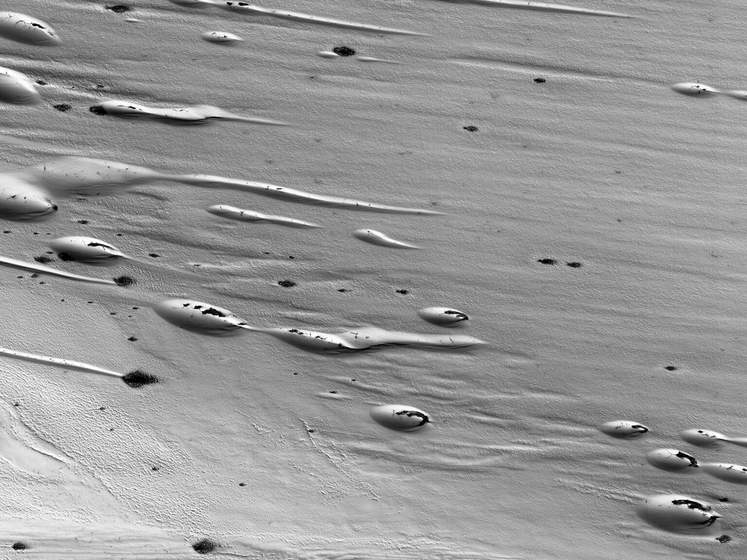 Ice melts in the springtime on Mars photo of the day for April 24
