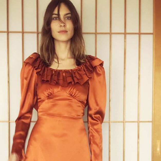alexa chung orange dress Alexa Chung looks classy in orange ruffle dress at Chopard party