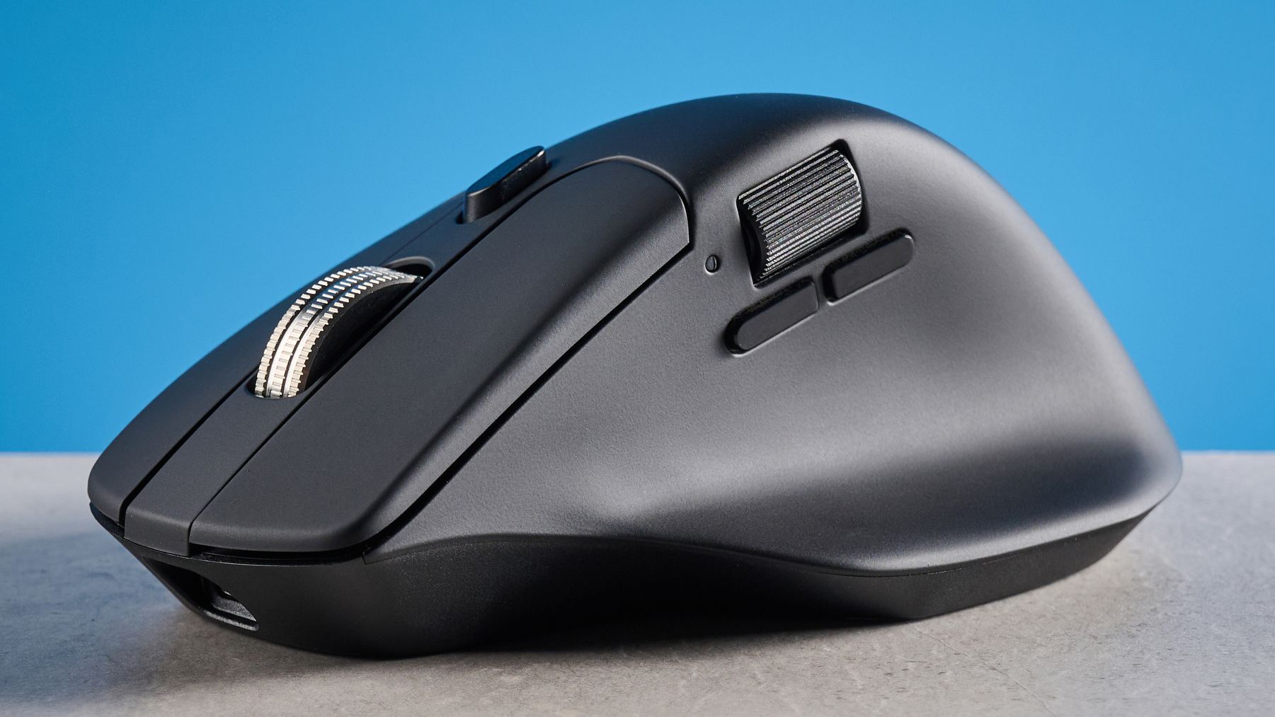 A black Keychron M6 8K ergonomic mouse