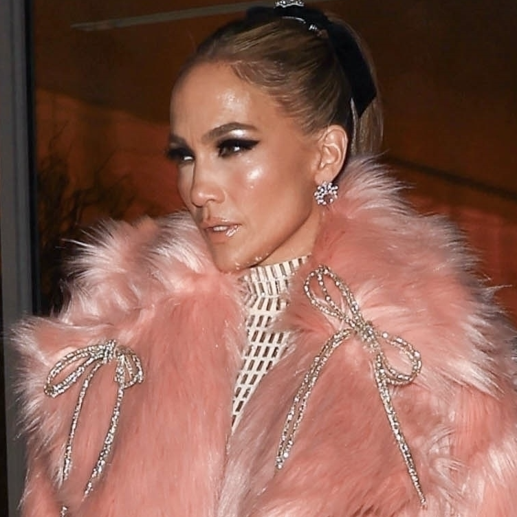 Jennifer Lopez Wears a Pink Fur Coat & $3,580 Gown for the