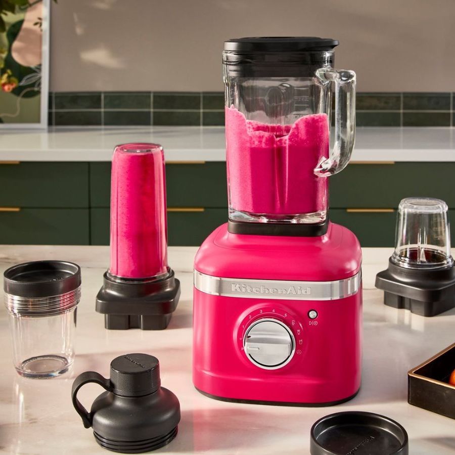 One of the best blenders, the KitchenAid K400 blender in hibiscus, mixing a pink smoothie