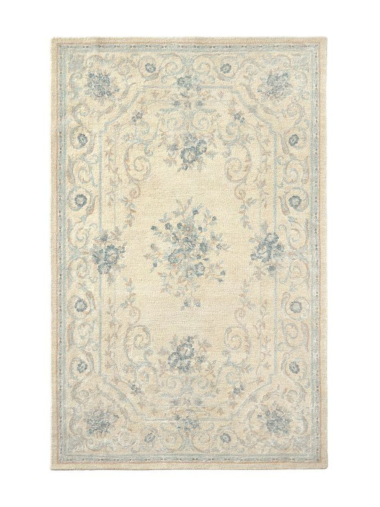 blue and white patterned pottery barn rug