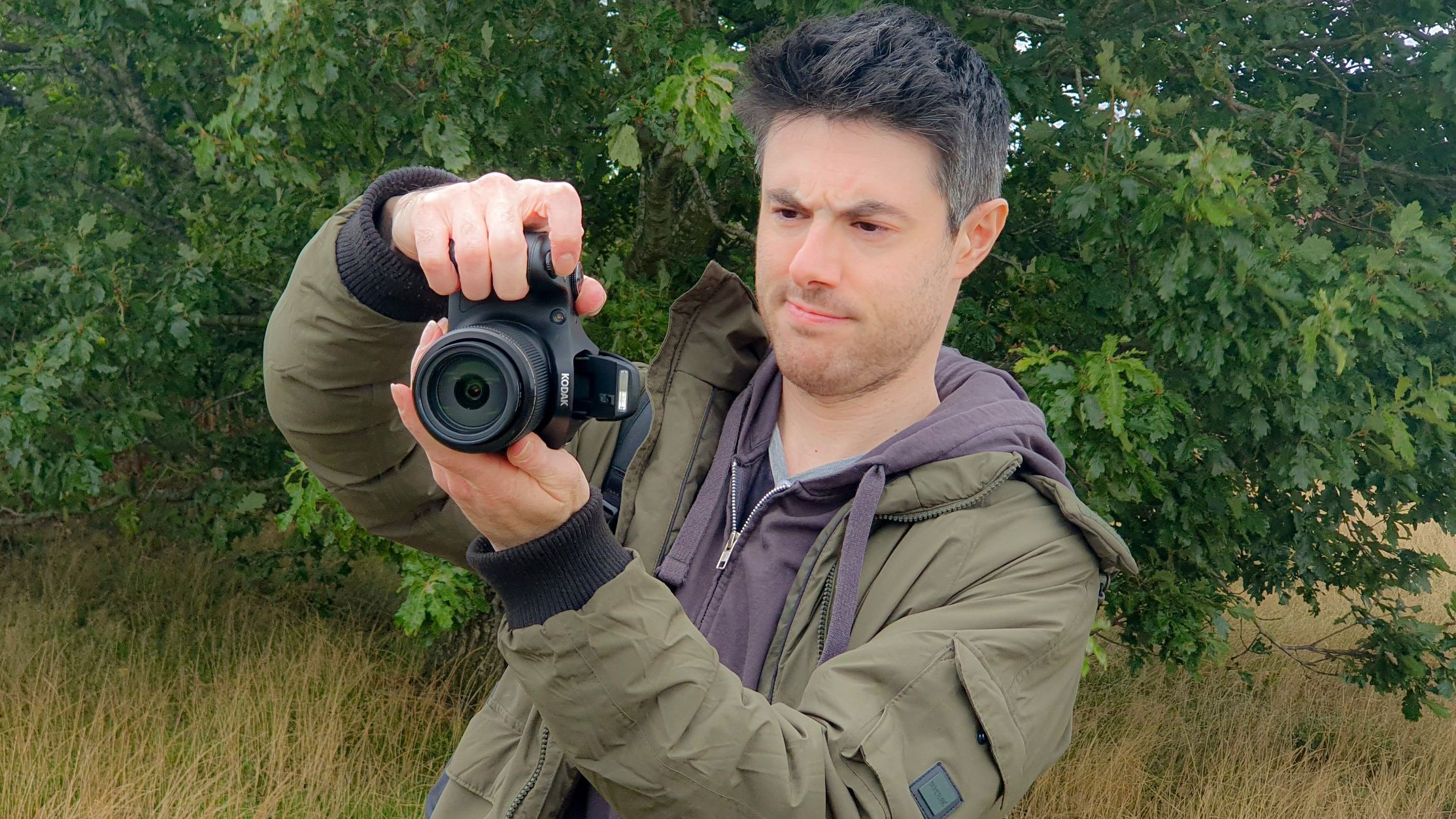 A man holding the Kodak AZ653
