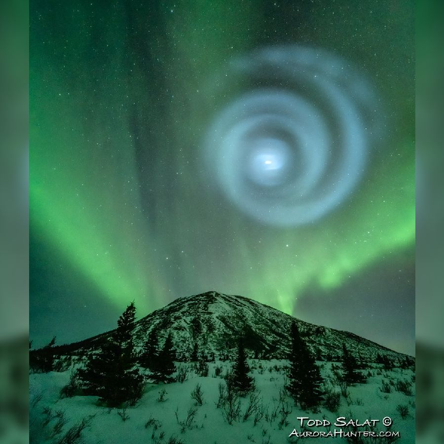 Ethereal whirlpool of light grows into a giant, perfect spiral